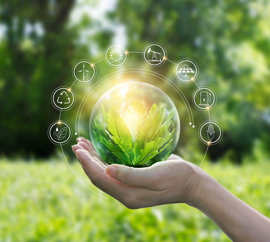 Ein grüner Hintergrund mit einer Hand und einer Pflanze darauf im Vordergrund